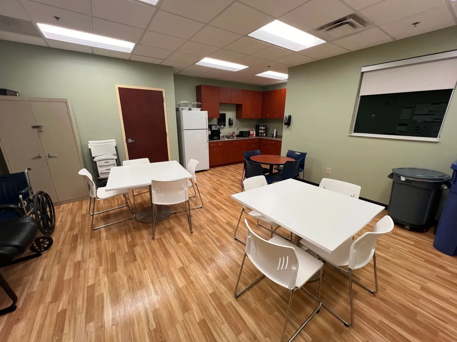 Office break room with clean tables and counters